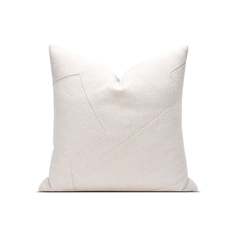 A white decorative pillow