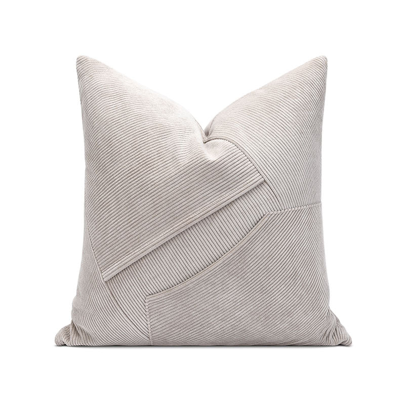 A light brown decorative pillow